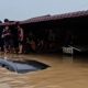 Proses Pemungutan Suara di Patumbak Tetap Berjalan Meski Dilanda Banjir Hampir Setinggi Rumah